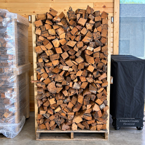Face cord pallet stacked with premium kiln-dried oak firewood